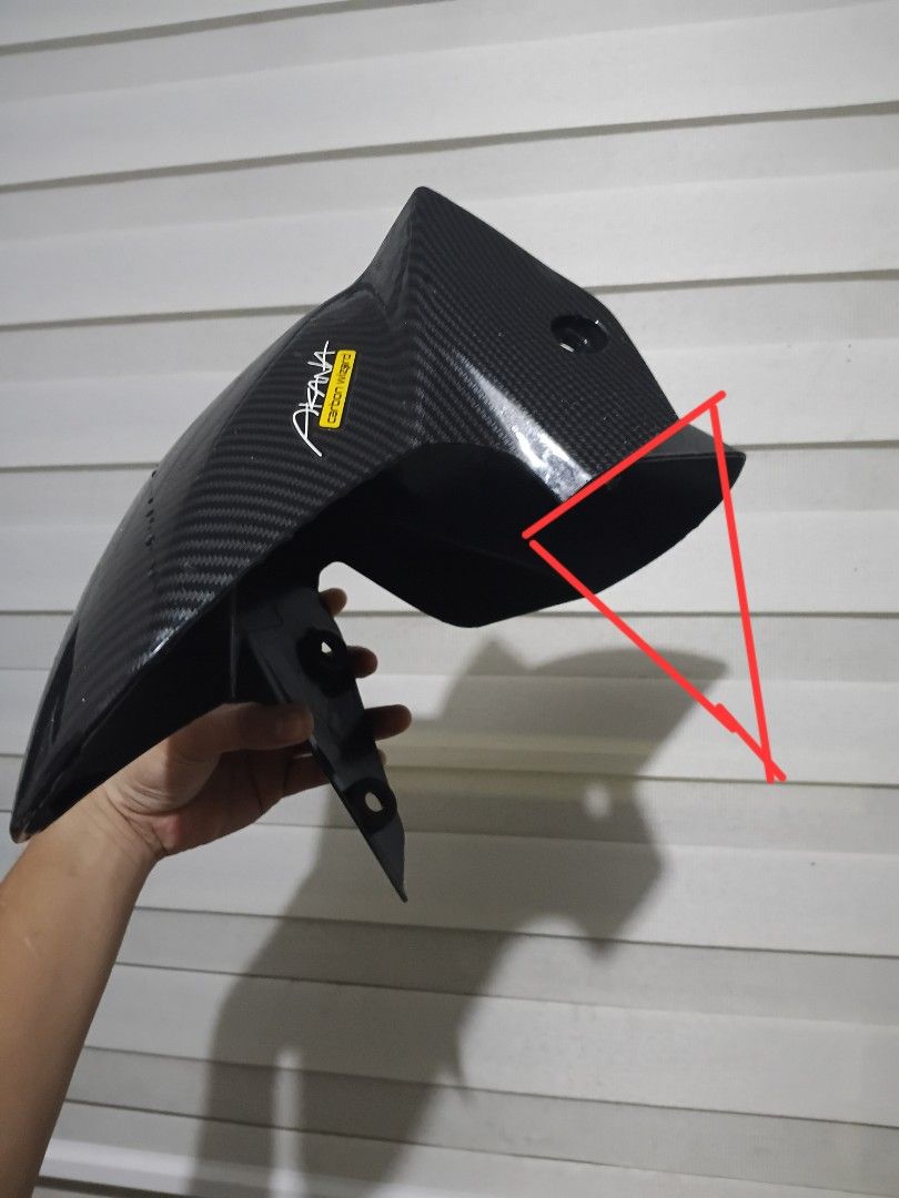 Akana Carbon Wizard Nmax v2 Front Fender (Category: Body Parts and Accessories) located in Manila. Submitted by unclevin29 (Listing ID 1467110636, Image 1). Description: - Issue putol turniltuhan sa left - Authentic Akana Carbon Wizard front fender - Real carbon fiber weave with a premium glossy finish - Lightweight yet durable construction - Pre-drilled mounting holes for hassle-free installation - Ideal as a stylish aesthetic upgrade or stock m