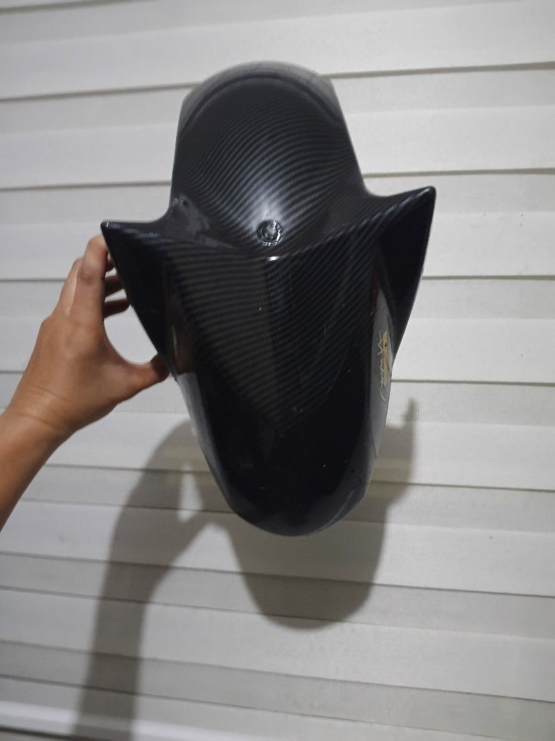 Akana Carbon Wizard Nmax v2 Front Fender (Category: Body Parts and Accessories) located in Manila. Submitted by unclevin29 (Listing ID 1467110636, Image 3). Description: - Issue putol turniltuhan sa left - Authentic Akana Carbon Wizard front fender - Real carbon fiber weave with a premium glossy finish - Lightweight yet durable construction - Pre-drilled mounting holes for hassle-free installation - Ideal as a stylish aesthetic upgrade or stock m