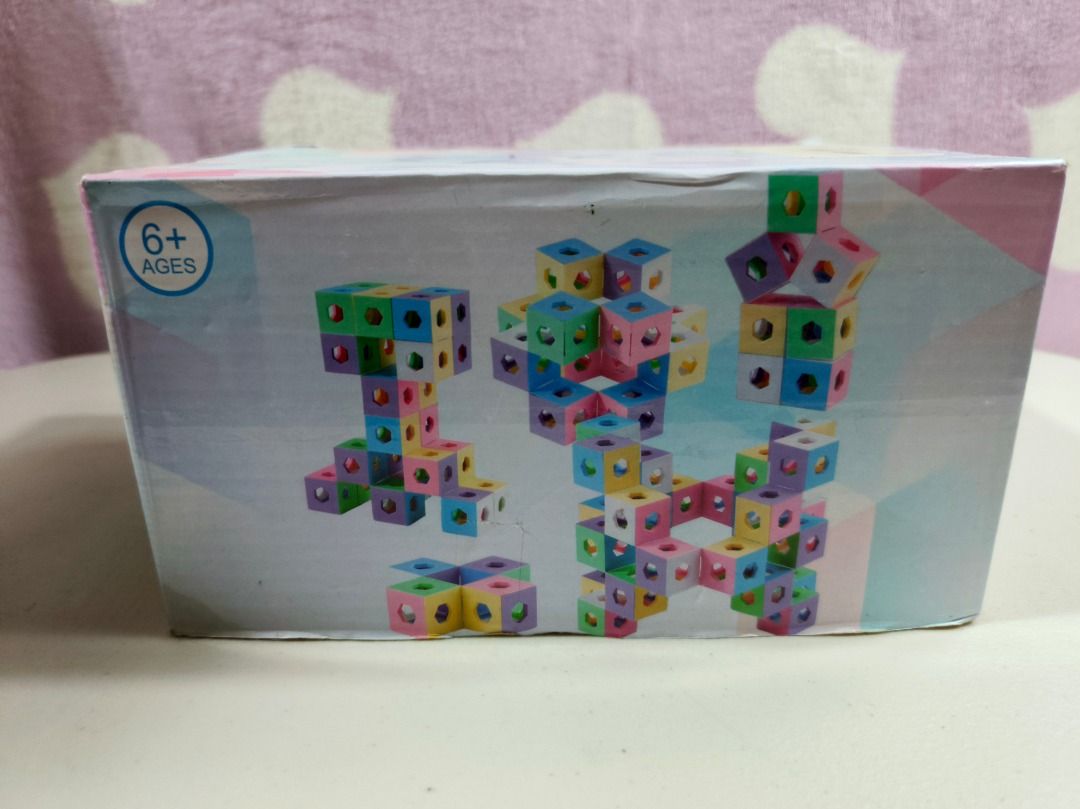 Akinashi Spatial Thinking Ghost Blocks Toy Set 144 PCS (Category: Lego & Building Sets) located in San Leonardo. Submitted by burgossanleonardo.12345 (Listing ID 1467103025, Image 3). Description: - Brand: Akinashi Spatial Thinking Ghost Blocks Puzzle Set - Piece count: 144 colorful pastel cubes featuring geometric cutout designs - Recommended age: Great for kids 6 years and up - Skills developed: Enhances spatial thinking, creativity, and struct