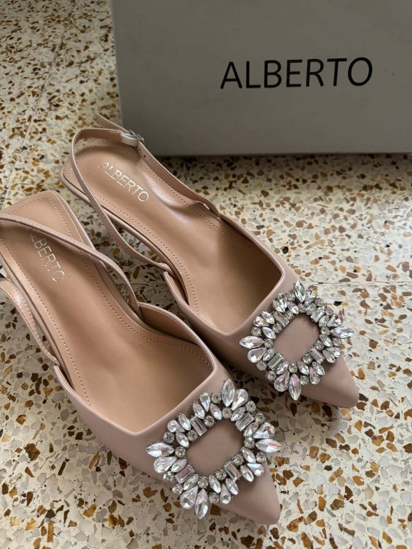 Alberto Heels Shoes (Category: Heels) located in San Juan City. Submitted by msmpatron (Listing ID 1467011566, Image 1). Description: - Brand: Alberto - Size: EU 39 - Color: Nude - Style: Slingback heels with pointed toe and low kitten heel - Feature: Eye-catching chunky crystal buckle on the front - Condition: Uppers are clean, soles show normal signs of previous use - Inclusions: Comes with original box original price:1599 Used once po with min