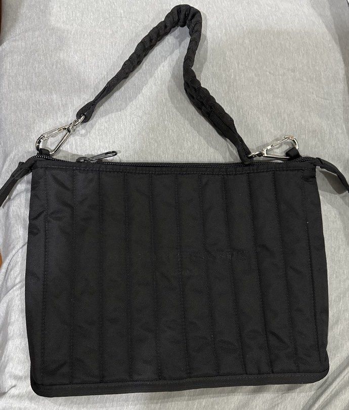 Alexander Wang Elite Tech Shoulder Bag (LAPTOP Bag) (Category: Other Mobile & Gadget Accessories) located in Manila. Submitted by krystalchewey_ (Listing ID 1467073319, Image 1). Description: Used Actual Photo Posted 1000php Laptop bag Flaws: tinangal yung brand ng bag sa harap AS-is • Laptop Capacity: Features a padded canvas lining specifically designed to fit a 13-inch laptop..