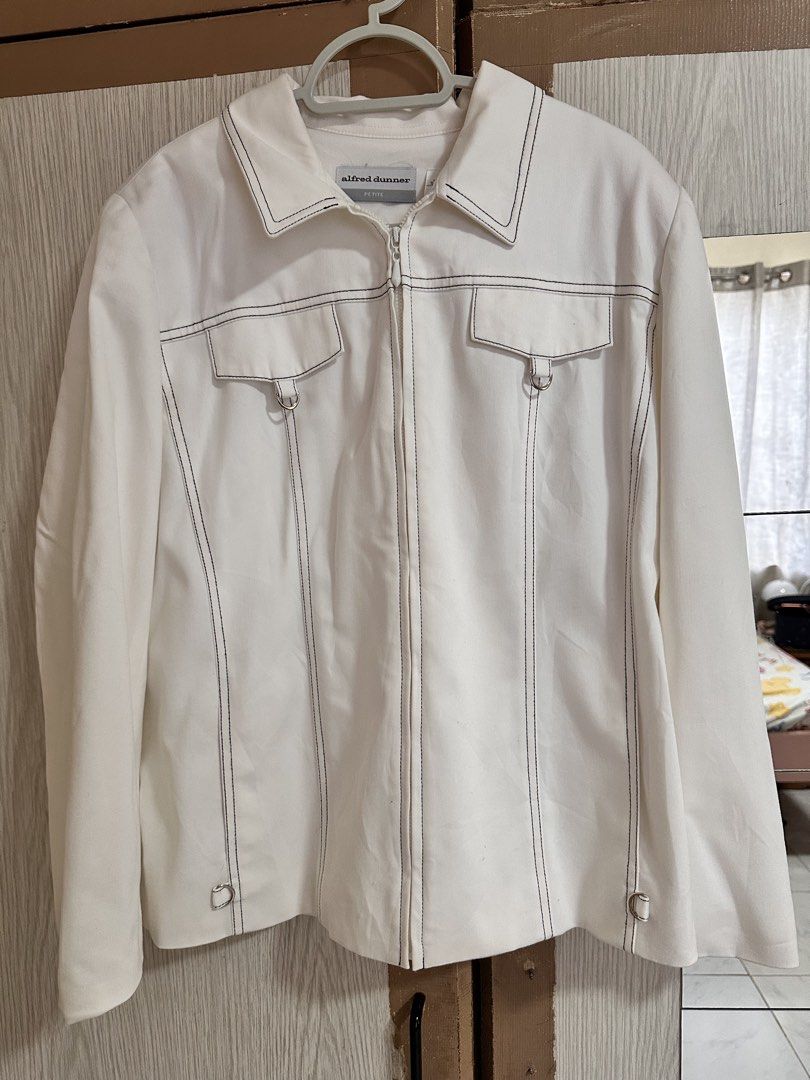 Alfred Dunner Petite White Contrast Stitch Zip Jacket (Category: Coats, Jackets and Outerwear) located in Paranaque City. Submitted by moonbea (Listing ID 1467041051, Image 1). Description: - Brand: Alfred Dunner - Size: Petite 12P - Color: Crisp white with contrasting dark stitching - Closure: Full front zipper with collar - Pockets: Two chest flap pockets with metal ring accents - Fit: Structured tailoring with front and back panel seams.