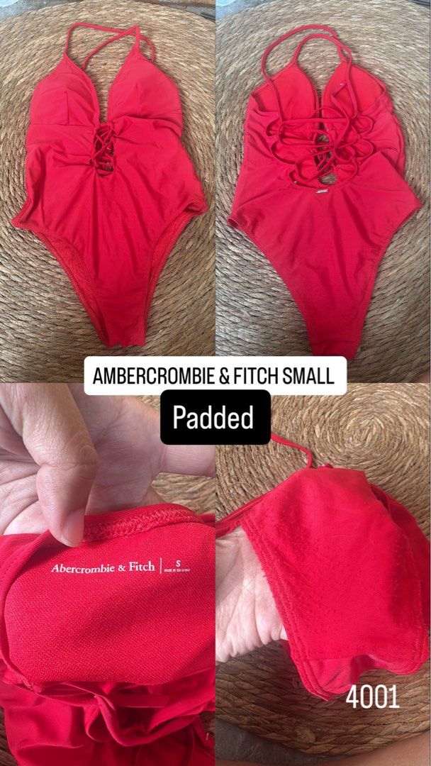 ambercrombie and fitch SMALL (Category: Bikinis & Swimsuits) located in Malabon City. Submitted by lheithriftshop (Listing ID 1467007864, Image 1). Description: The image shows a red one-piece swimsuit featuring a deep V-neck, a front lace-up tie detail, and thin crisscross straps, resembling styles from Abercrombie & Fitch Swimwear.