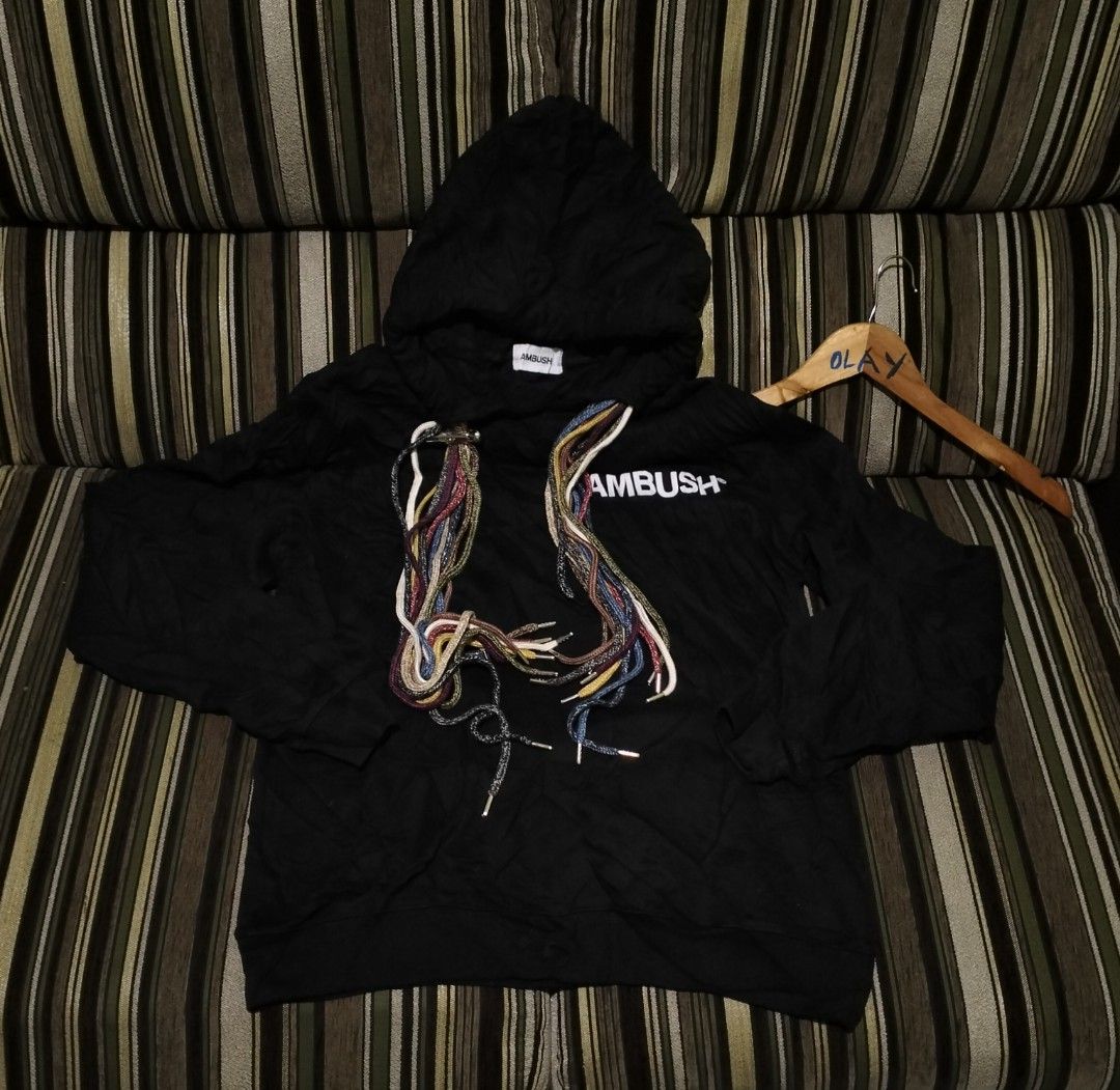 AMBUSH Black Drawstring Hoodie (Category: Hoodies) located in Taguig. Submitted by conniemdcruz (Listing ID 1467094587, Image 1). Description: - Brand: AMBUSH (Made in Japan) - Material: 100% Cotton (Machine wash cold, line dry) - Color: Black with white chest logo - Size: Label Size 1 - Special Features: Unique multicolored braided drawstrings with silver metal tips and hardware - Condition: Excellent / Ready to ship - Mode of Payment: GCash, Ba