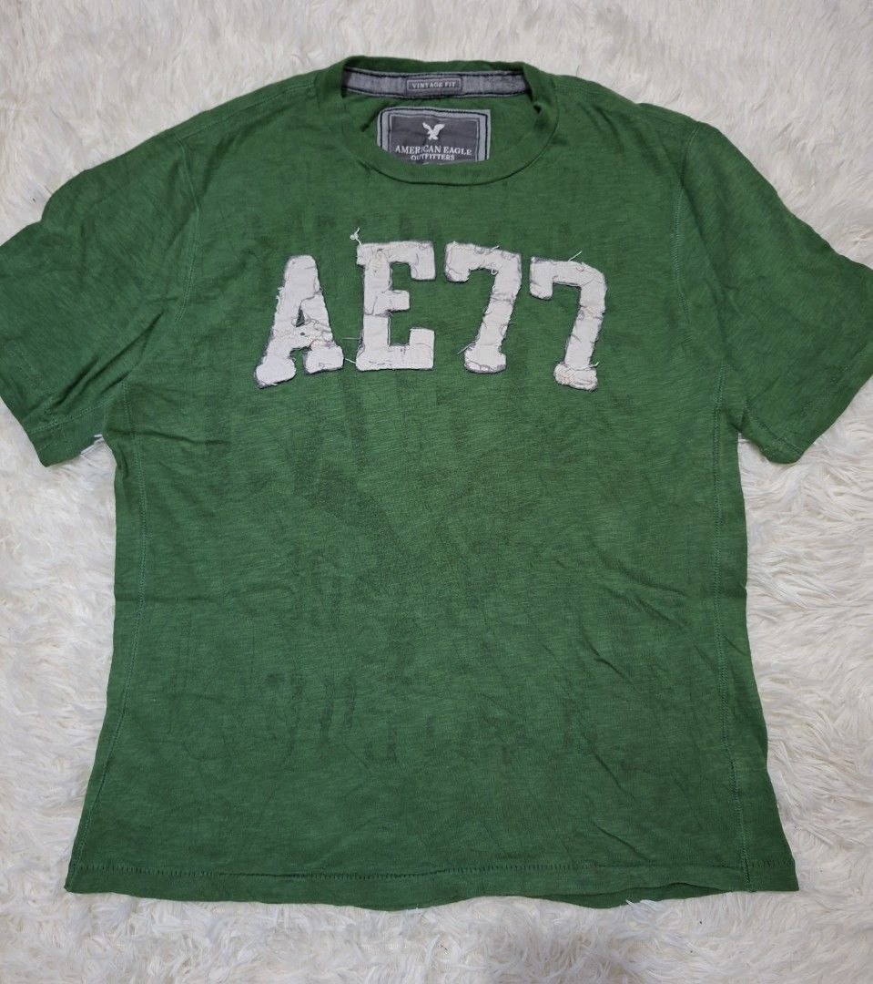 AMERICAN EAGLE Y2K MENS SHIRT (Category: Activewear) located in Trece Martires City. Submitted by eszpincxks (Listing ID 1467044438, Image 1). Description: American eagle mens tshirt DIMES: 20W,27L SIZE: MEDIUM CONDITION: 9.8/10 ISSUE: NONE.