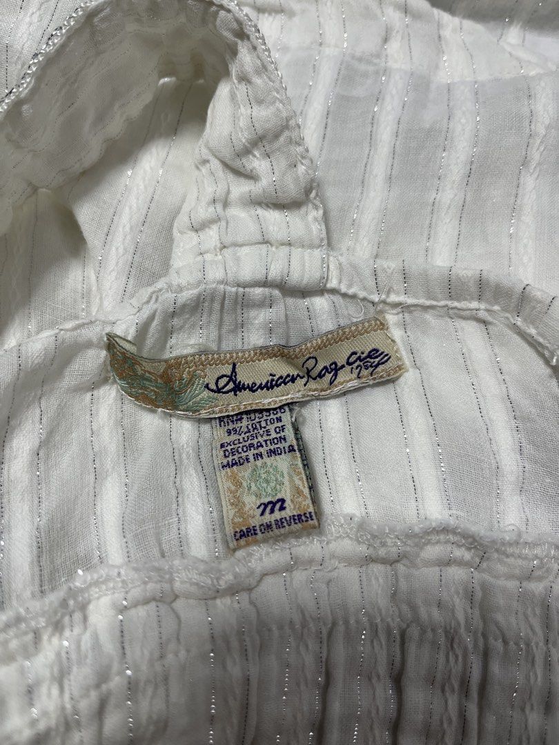 American Rag Cie Top (Category: Sleeveless) located in Manila. Submitted by kerlythreads (Listing ID 1467138886, Image 3). Description: medium issue pink stain as seen on pic (not noticeable when worn).