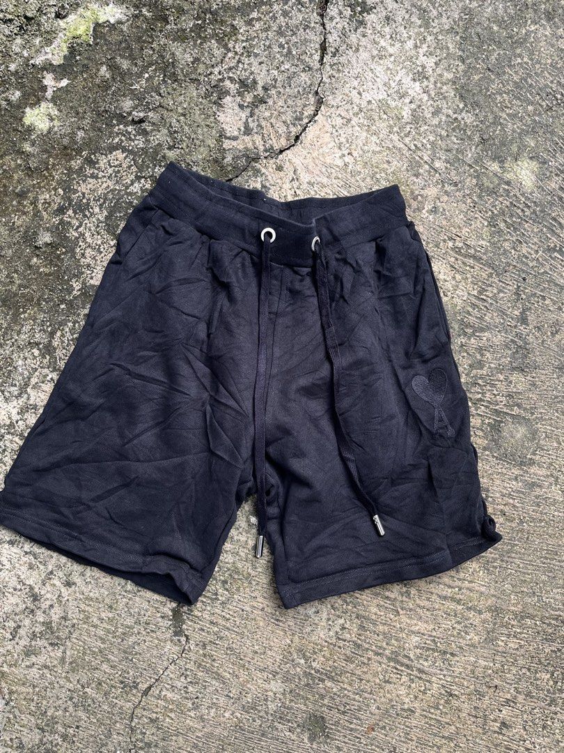 Ami Paris Black Cotton Sweatshorts (Category: Shorts) located in Manila. Submitted by shanaaa.collects (Listing ID 1466973049, Image 1). Description: - Brand: Ami Paris - Item: Black Cotton Sweatshorts - Condition: Brand new / Excellent - Material: Soft, premium cotton - Details: Tonal embroidered heart logo, branded silver eyelets and metal tips, drawstring waistband, two side pockets - Origin: Made in Portugal - Fit: Relaxed, comfortable lounge