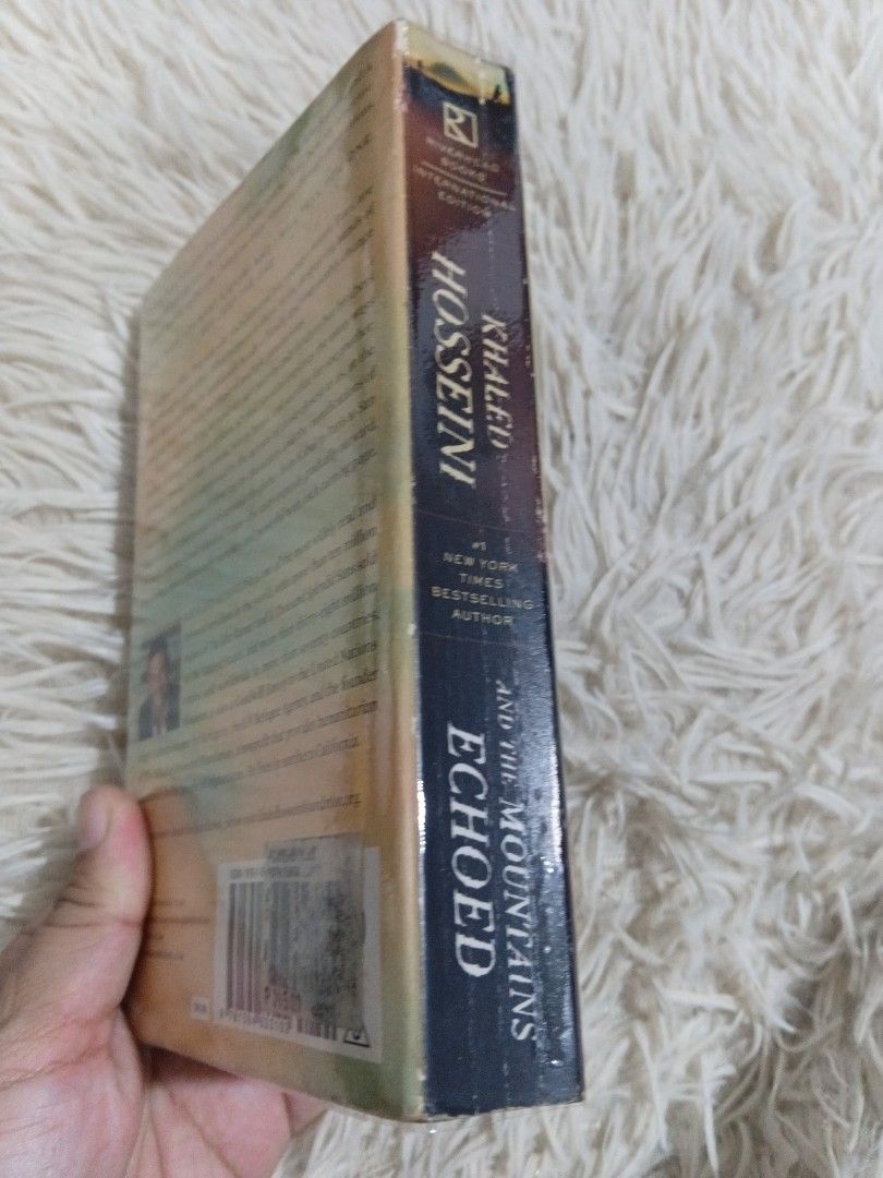 And the Mountains Echoed by Khaled Hosseini (Category: Storybooks) located in Cavite. Submitted by nathstelein_finds (Listing ID 1467069281, Image 3). Description: - Title: And the Mountains Echoed by Khaled Hosseini - Edition: Riverhead International Edition (Paperback) - Condition: Spine intact with visible title; original price tag sticker on the back barcode - Features: Author photo, biography, and publisher details on the back cover - Perfec