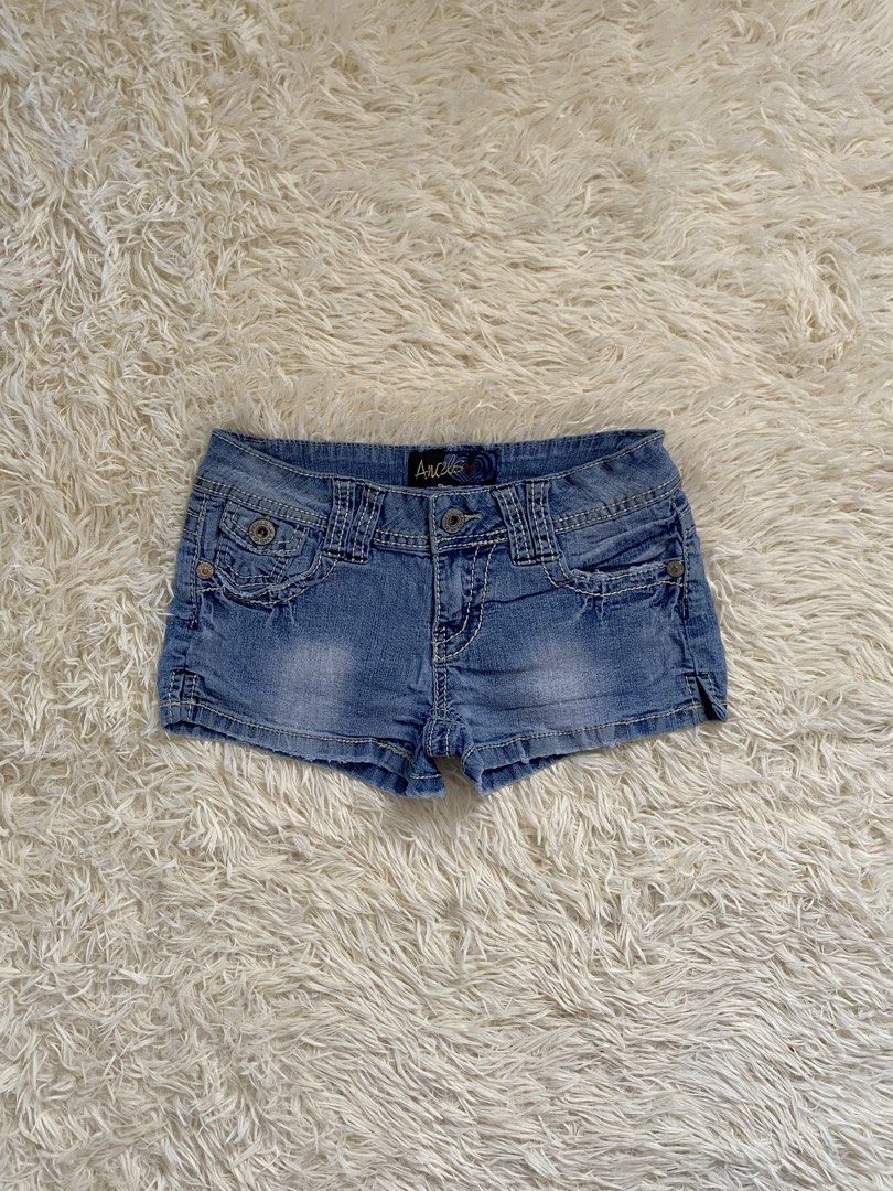 Angels Denim Jean Shorts (Category: Shorts) located in Guagua. Submitted by zenn_vi (Listing ID 1467132323, Image 1). Description: - Brand: Angels - Style: Low rise denim shorts - Color: Light wash blue - Details: Contrast stitching, branded hardware, and woven labels - Pockets: Button closures on back flap pockets and front coin pocket - Best for: Summer days, casual outings, and pairing with basic tees or crop tops.