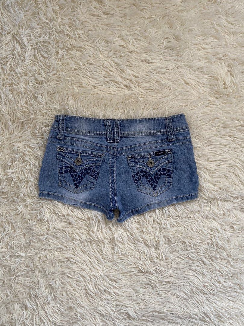 Angels Denim Jean Shorts (Category: Shorts) located in Guagua. Submitted by zenn_vi (Listing ID 1467132323, Image 2). Description: - Brand: Angels - Style: Low rise denim shorts - Color: Light wash blue - Details: Contrast stitching, branded hardware, and woven labels - Pockets: Button closures on back flap pockets and front coin pocket - Best for: Summer days, casual outings, and pairing with basic tees or crop tops.
