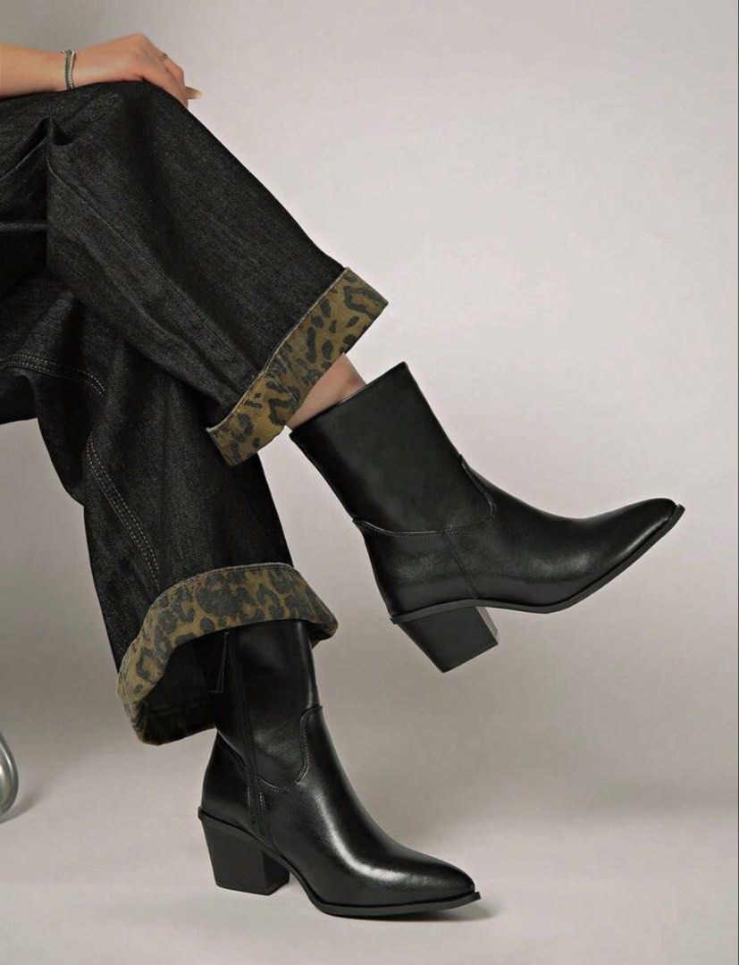 Ankle boots (Category: Boots) located in Quezon City. Submitted by justdeclutter2023 (Listing ID 1467152641, Image 3). Description: Black mid-calf boots with a sleek pointed toe. Smooth finish, classic western inspired look that pairs easily with wide leg denim or skirts. Super comfy. Used once for my Europe travel. Original price: 1,500 Now: 800.