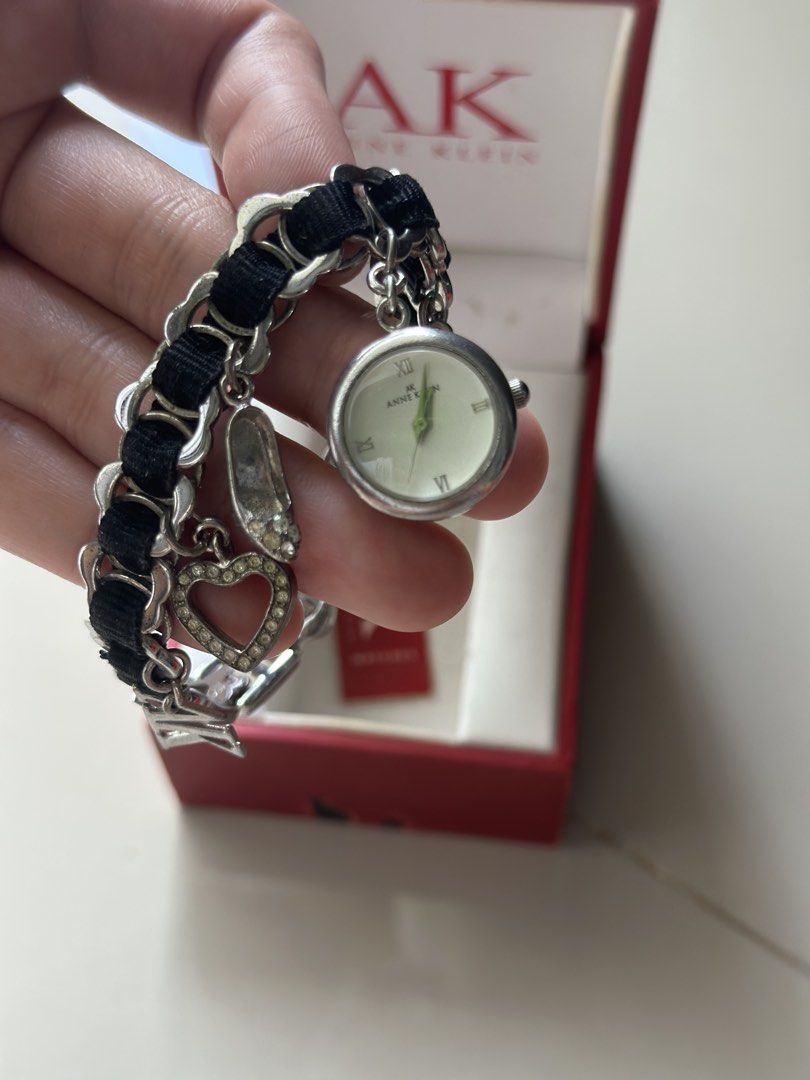 Anne Klein Silvertone Charm Bracelet Watch (Category: Women's Watches) located in Pasig City. Submitted by claysome (Listing ID 1466994344, Image 2). Description: Anne Klein Silvertone Charm Bracelet Watch -Comes with Original Box -10/10 .