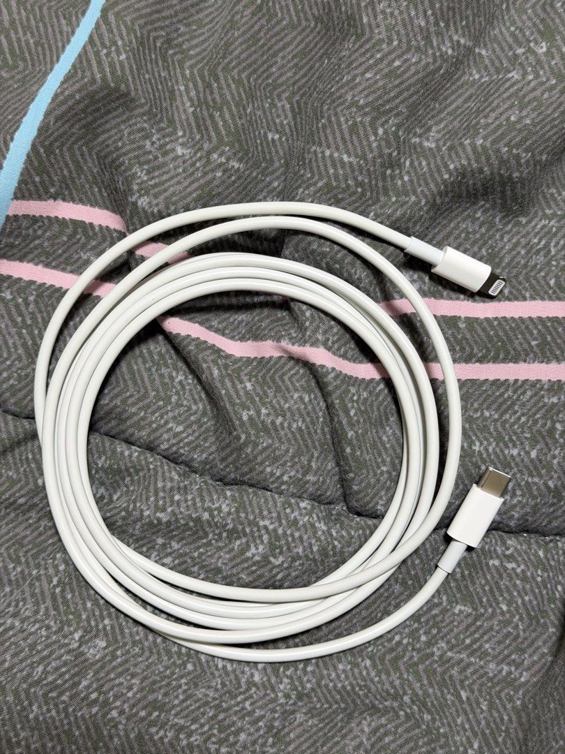 Apple Iphone USB-C to lightning cable 2 meters (Category: Chargers & Cables) located in Binan City. Submitted by alreadyloved.p (Listing ID 1467150999, Image 1). Description: - Brand: Apple - Type: USB-C to Lightning Cable - Length: 2 meters (extra long for convenience) - Color: White - Condition: Good as new, well-maintained - Perfect for fast charging and syncing compatible iPhone and iPad models.