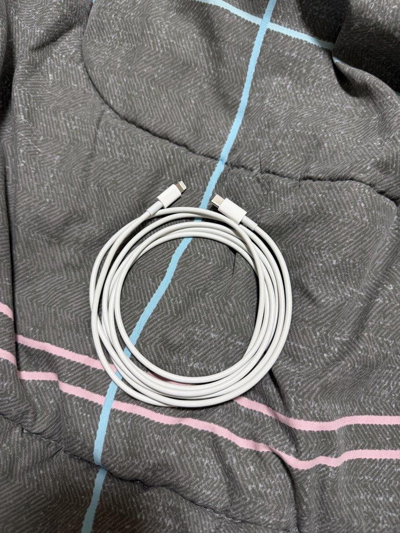 Apple Iphone USB-C to lightning cable 2 meters (Category: Chargers & Cables) located in Binan City. Submitted by alreadyloved.p (Listing ID 1467150999, Image 2). Description: - Brand: Apple - Type: USB-C to Lightning Cable - Length: 2 meters (extra long for convenience) - Color: White - Condition: Good as new, well-maintained - Perfect for fast charging and syncing compatible iPhone and iPad models.