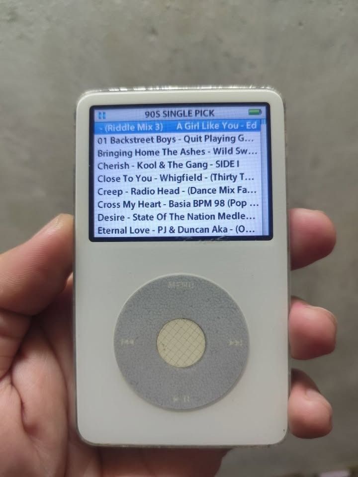 Apple iPod Classic White 30GB 5.5 video (Category: Portable Music Players) located in Caloocan City. Submitted by rarewind.39993d (Listing ID 1467102131, Image 2). Description: - Model: iPod Classic 5.5 video (MA446X, Version 1.3) - Storage: 30gig capacity (Pre-loaded with 733 great songs) - Design: Classic white housing with standard click wheel at plastic protector sa clickweel at matagal malobat. no issue sa itunes.. - location congressional q