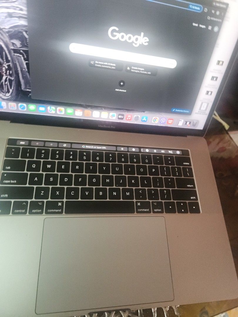 Apple MacBook Pro 2017 14 inch touch bar (Category: Laptops & Notebooks) located in Manila. Submitted by dj3002 (Listing ID 1467054637, Image 2). Description: no issue 512 gb i7 16gb ram unit and org charger - Color: Space Grey - Keyboard: QWERTY layout with large trackpad - Condition: Clean body with minimal edge wear, clear and fully functional screen - Performance: Runs macOS smoothly, great for work, school, and daily browsing - Battery: Hold