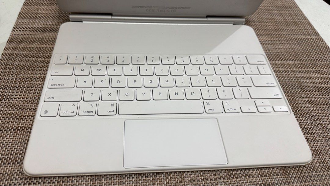 Apple Magic Keyboard for iPad Pro 12.9-inch White (Category: Computer Keyboard) located in Quezon City. Submitted by james.mrco (Listing ID 1467018728, Image 2). Description: FOR SALE ONLY SLIGHTLY USED IPAD MAGIC KEYBOARD 12.9 INCH White color. Still Presentable, Like New.. NO Box, Serial Number posted, Actual Photos posted. All Keys Working, No sign of Peeling. Compatible with iPad Pro Gen 3rd, 4th Gen, 5th, 6th IPad Air M2 13 inch 6th, 7th Gen