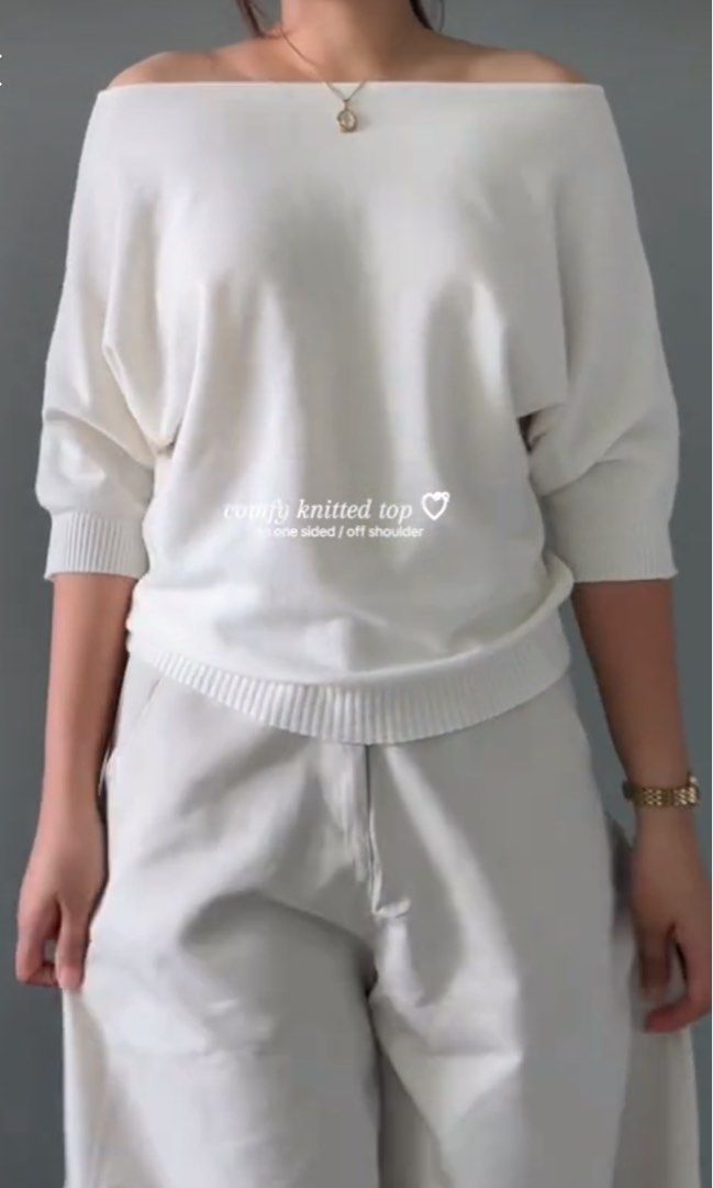 Apricot Off Shoulder Comfy Knitted Top (Category: Longsleeves) located in Taguig. Submitted by heyitsfrann (Listing ID 1467135071, Image 2). Description: - Color: Apricot - Style: Off-shoulder (can be worn on one shoulder or both) - Material: Super soft knit with ribbed hem and cuffs - Fit: Relaxed fit with mid-length sleeves - Versatility: Pairs great with jeans or wide-leg pants - Condition: Clean and well-maintained.