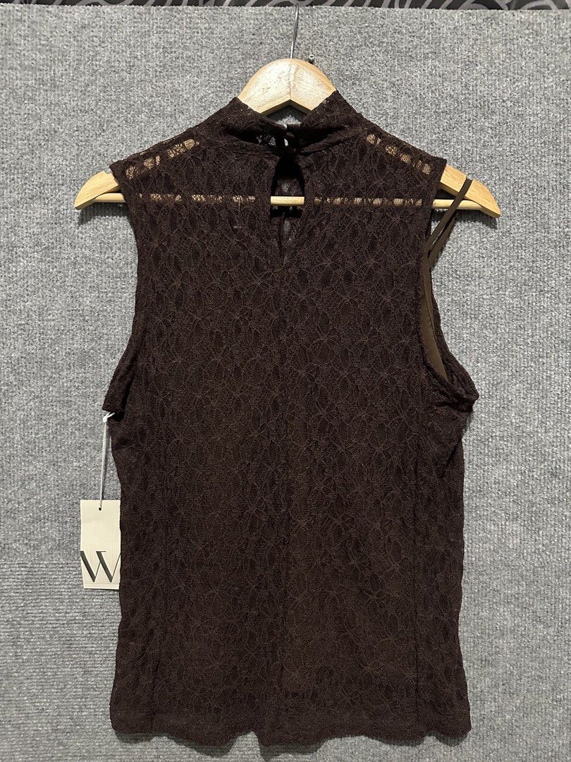 Apt. 9 Brown Lace Mock Neck Tank Top (Category: Sleeveless) located in Villasis. Submitted by justinramosonfb (Listing ID 1467116803, Image 1). Description: - Brand: Apt. 9 - Style: Mock neck tank top with intricate lace overlay and back keyhole cutout - Size: M (fits true to size) - Material: 100% polyester - Condition: Brand new with tags (BNWT), never worn - Versatility: Great for layering or wearing on its own.