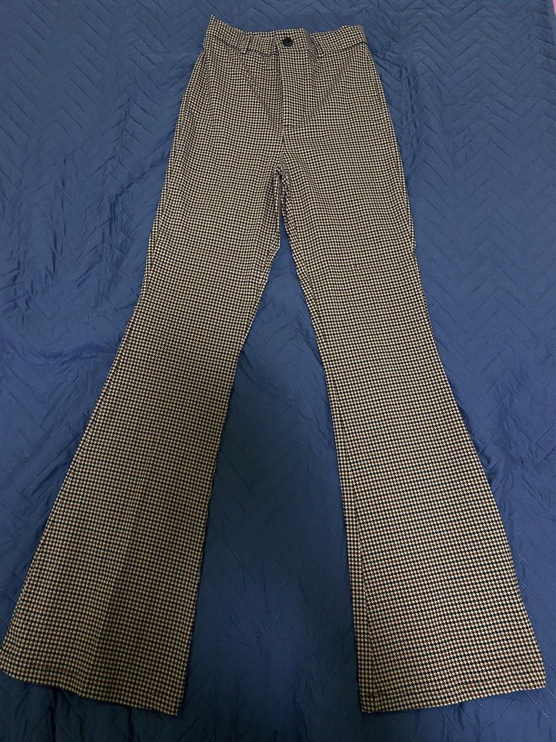 Ardene Brown Houndstooth Flare Pants (Category: Jeans) located in Manila. Submitted by escherichiaa (Listing ID 1467110030, Image 1). Description: - Brand: Ardene - Size: XS - Pattern: Brown & black houndstooth - Style: High-waisted flare pants with front button closure - Fit: Fitted through the thigh with a bottom flare - Fabric: Stretchy and super comfortable.