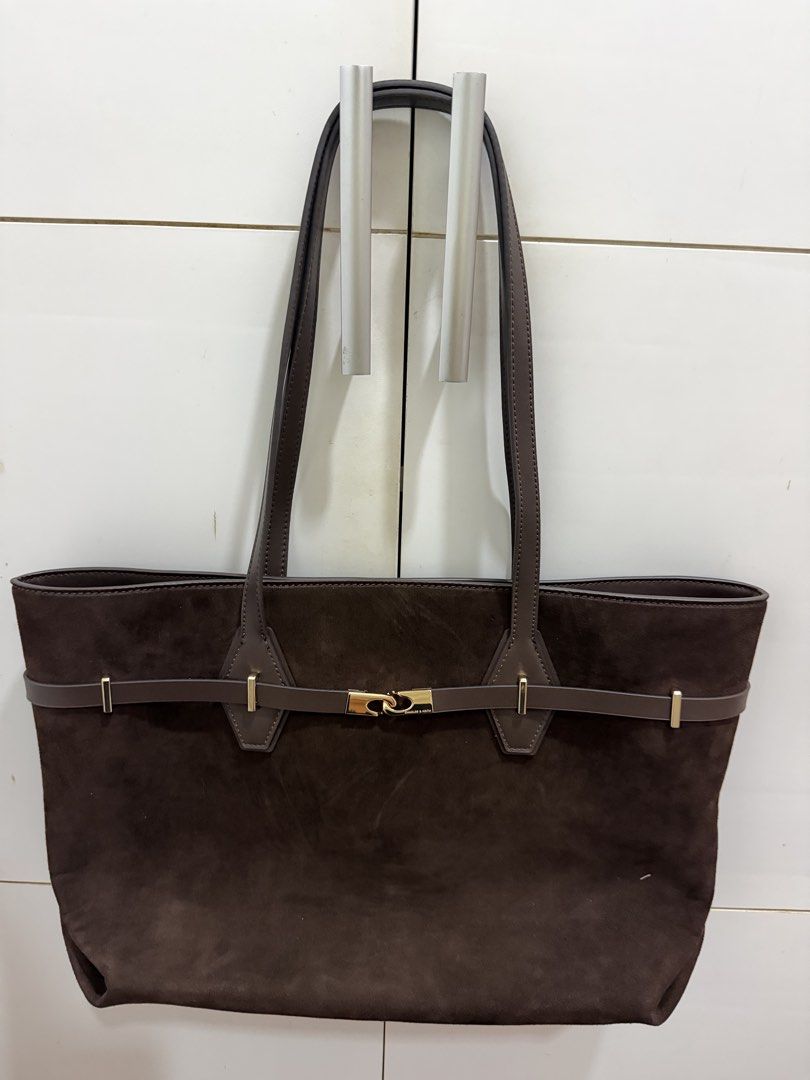 Arlet Recycled Suede Double-Handle Belted Tote Bag (Category: Tote Bags) located in Davao. Submitted by pamdyclutters (Listing ID 1467133463, Image 1). Description: - Brand: Charles & Keith - Style: Suede Tote Bag (XL) - Color: Espresso Brown with gold-tone hardware - Condition: Brand new with original tag attached - Features: Spacious interior, slip pockets, secure zipper pocket, and magnetic button closure - Design: Decorative thin front strap 