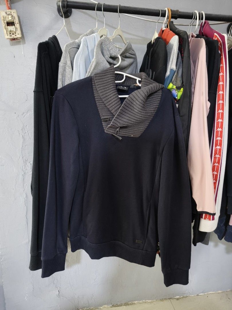 Armani Exchange Navy Blue Shawl Collar Sweatshirt (Category: Coats, Jackets and Outerwear) located in Binan City. Submitted by makinpeso0622 (Listing ID 1467064532, Image 1). Description: - Brand: Armani Exchange - Color: Navy blue with thick ribbed grey shawl collar and toggles - Details: Long sleeves, banded cuffs and hem, small rubber logo patch near bottom - Material: Cotton-polyester blend shell; wool-nylon trim - Care: Machine washable cold