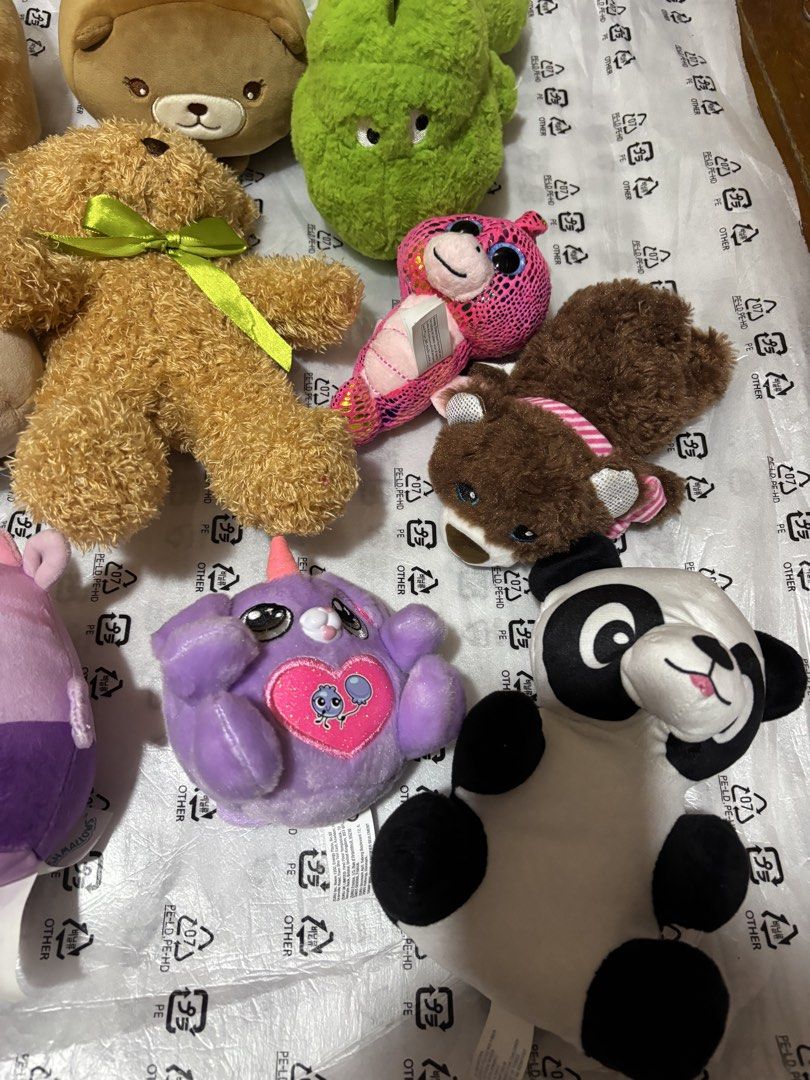 Assorted Plush Toys and Squishmallows (Category: Plushies & Soft Toys) located in Manila. Submitted by wardrobeinmnl (Listing ID 1467110991, Image 2). Description: - Variety of adorable plushies: Squishmallows cow and pig, penguin, brown bear with green ribbon, green dinosaur, and more - Made with ultra-soft, huggable materials - Open to buying as a whole set or picking individual favorites - PM for inquiries or to check availability!.