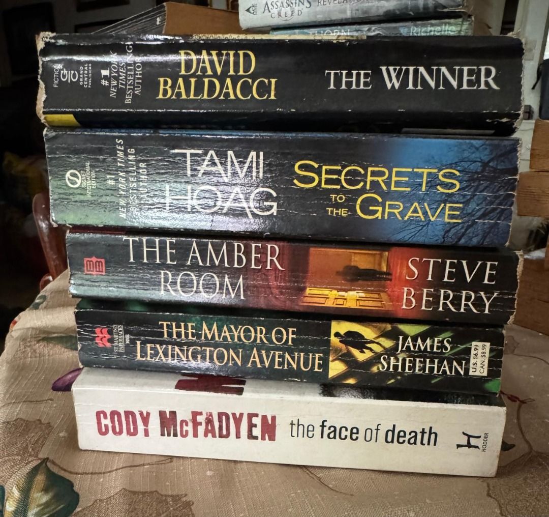 Assorted Thriller and Fiction Paperbacks Lot (Category: Storybooks) located in Paranaque City. Submitted by jiggybautista (Listing ID 1467165781, Image 1). Description: - Set of 6 paperback thrillers and fiction novels - Features authors: Cody McFadyen, James Sheehan, Steve Berry, Tami Hoag, and David Baldacci - Selling as a complete bundle only - Normal shelf wear on covers and spine edges - Great choice for mystery and suspense lovers.