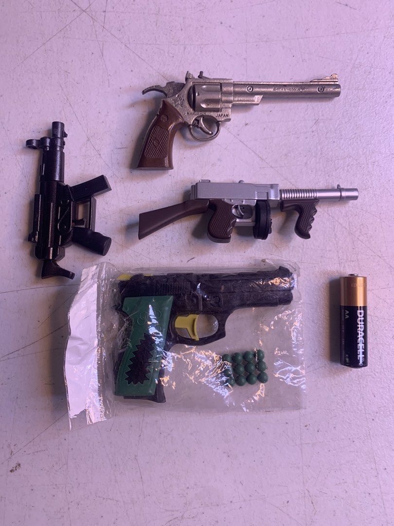 Assorted Toy Guns - Vintage and Retro (Category: Action & Battle Toys) located in Carmona. Submitted by bihira (Listing ID 1467040370, Image 1). Description: Assorted Toy Guns - Vintage and Retro - WYSIWYG - Metal - Magnum Revolver (bent barrel) - Plastic - Palengke Toy - Mini Hand Guns - Working Gimmiks.