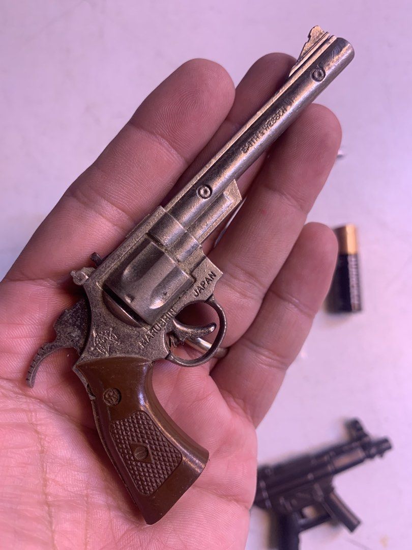 Assorted Toy Guns - Vintage and Retro (Category: Action & Battle Toys) located in Carmona. Submitted by bihira (Listing ID 1467040370, Image 3). Description: Assorted Toy Guns - Vintage and Retro - WYSIWYG - Metal - Magnum Revolver (bent barrel) - Plastic - Palengke Toy - Mini Hand Guns - Working Gimmiks.