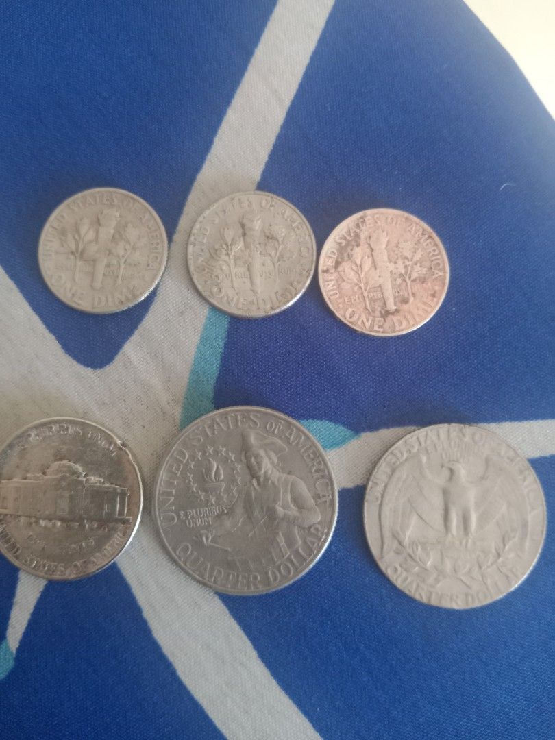 Assorted Vintage Foreign and US Coins Collection (Category: Vintage Collectibles) located in Mandaluyong City. Submitted by mysticwolf_54963c (Listing ID 1467032875, Image 2). Description: - Mixed coin lot: US quarters, dimes, nickels, pennies, Canadian, and Philippine currency - Includes vintage pieces featuring Queen Victoria and Elizabeth II - Condition: Mixed, shows natural circulation wear, toning, and tarnish - Perfect for beginner coin col