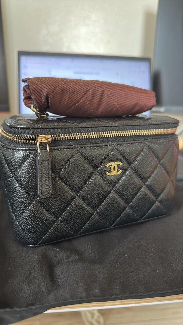 Authentic Chanel Black Caviar Vanity Bag (Category: Luxury Bags & Wallets) located in Los Banos. Submitted by bianxster (Listing ID 1467008059, Image 2). Description: - Guaranteed authentic - Material: Quilted Caviar Leather - Inclusion: complete - Condition: Pristine and well-maintained (no flaws).