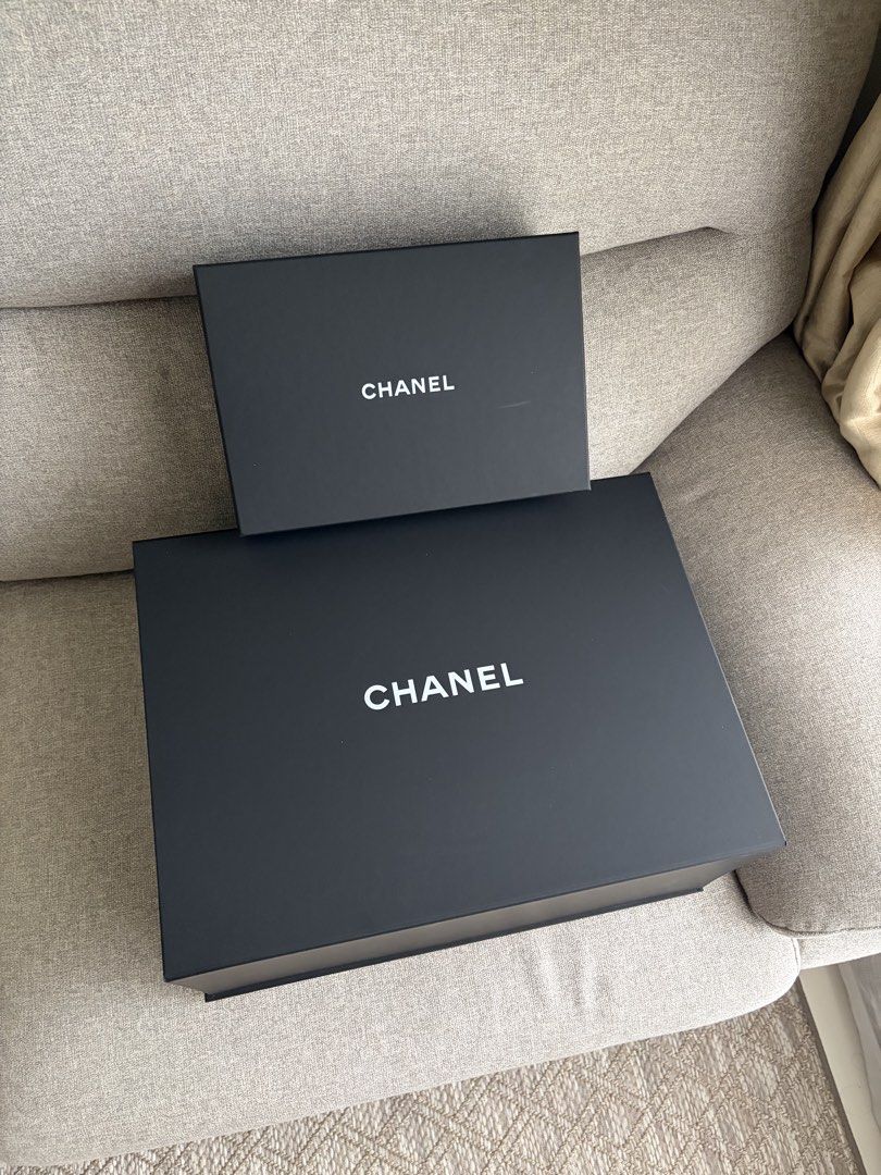 Authentic Chanel Boxes (empty) (Category: Luxury Bags & Wallets) located in Pasig City. Submitted by dm.shop (Listing ID 1467072400, Image 1). Description: Authentic Chanel Boxes for sale as a bundle. Refer to the photos for actual dimensions. 1 - large box (magnetic closure) 1 - small box (2pc lift-off type lid).