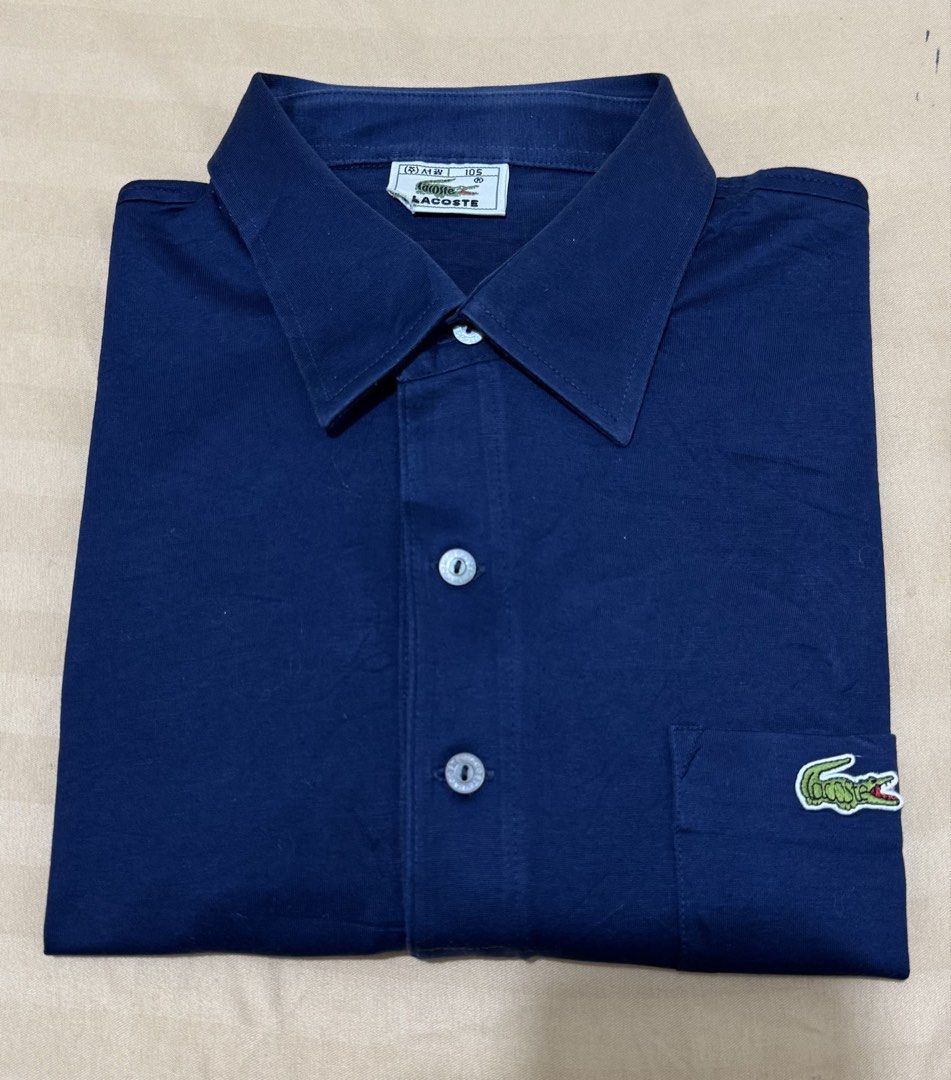 Authentic Lacoste Long Sleeve Navy blue (Category: Coats, Jackets and Outerwear) located in Bacolod City. Submitted by thriftppy_ (Listing ID 1466997180, Image 3). Description: LACOSTE VINTAGE NAVY BLUE LONG SLEEVE Authentic/Legit Size: Large Width: 22 Length: 28 Color rate: 9.8/10 Condition: Excellent near new Issue: None DM for sure buyers 📥 Mode of payment:GCASH, BANK TRANSFER Unli vouch and vc for safety transaction. 📌Color may vary due to 