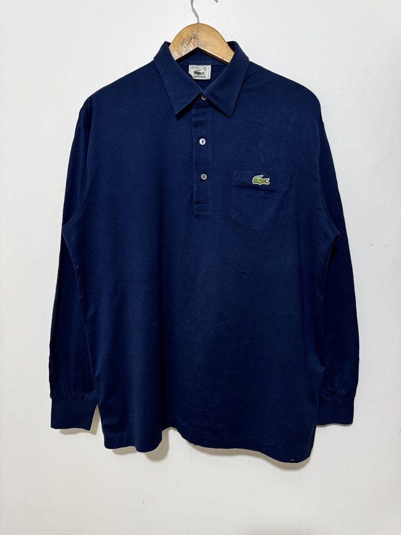 Authentic Lacoste Long Sleeve Navy blue (Category: Coats, Jackets and Outerwear) located in Bacolod City. Submitted by thriftppy_ (Listing ID 1466997180, Image 2). Description: LACOSTE VINTAGE NAVY BLUE LONG SLEEVE Authentic/Legit Size: Large Width: 22 Length: 28 Color rate: 9.8/10 Condition: Excellent near new Issue: None DM for sure buyers 📥 Mode of payment:GCASH, BANK TRANSFER Unli vouch and vc for safety transaction. 📌Color may vary due to 