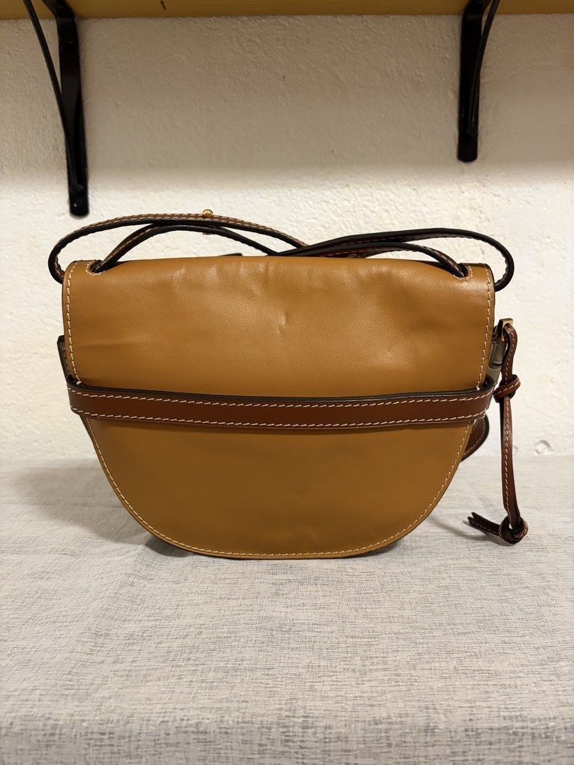 Authentic Loewe Gate Puzzle Small (Category: Luxury Bags & Wallets) located in Paoay. Submitted by ysmattic (Listing ID 1467048114, Image 2). Description: 100% guaranteed authentic Loewe. No major flaws. Fits 18 Pro Max and S26 Ultra phones. Signs of usage are visible (see last two photos). This is super steal! Price in the preloved market is 60k and above. .