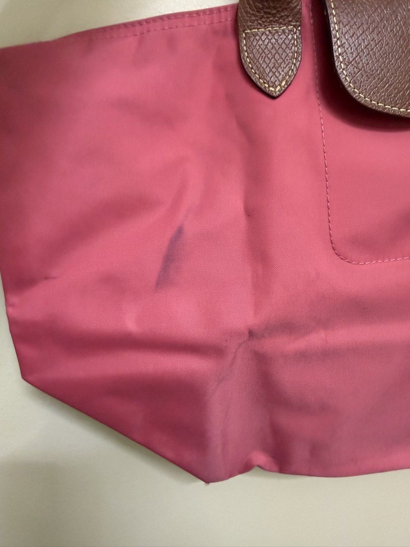 AUTHENTIC LONGCHAMP Le Pliage Short Handle (Category: Belt bags, Clutches and Pouches) located in Manila. Submitted by iamken28 (Listing ID 1467134998, Image 2). Description: Selling at a super low price since my flaws but this is bought in Japan. RFS: wont use anymore.