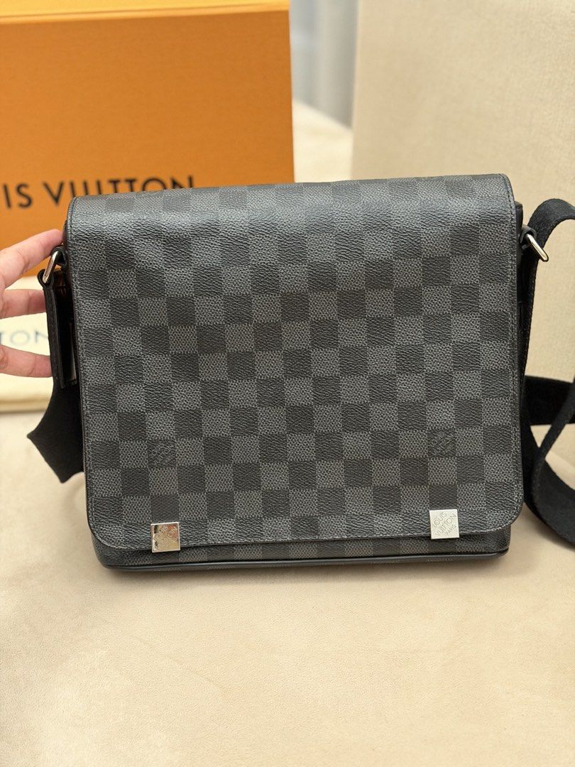 Authentic Louis Vuitton Graphite District Messenger Bag (Category: Sling Bags) located in Manila. Submitted by maria_2326 (Listing ID 1467009631, Image 3). Description: 💯% Authentic w/ box and dust bag No lowballing! Location: Manila/QC.