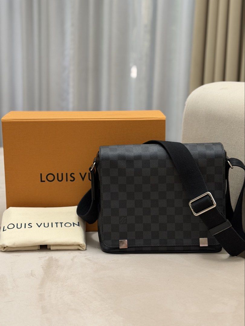 Authentic Louis Vuitton Graphite District Messenger Bag (Category: Sling Bags) located in Manila. Submitted by maria_2326 (Listing ID 1467009631, Image 1). Description: 💯% Authentic w/ box and dust bag No lowballing! Location: Manila/QC.