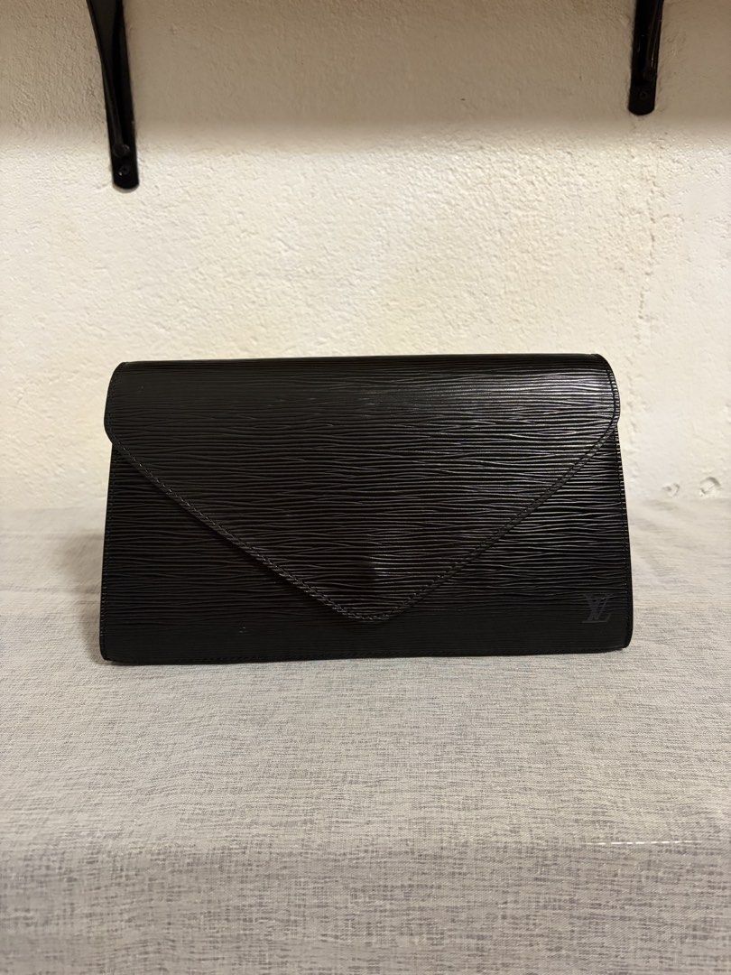 Authentic LV Epi Clutch (Category: Luxury Bags & Wallets) located in Paoay. Submitted by ysmattic (Listing ID 1467050048, Image 2). Description: 100% guaranteed authentic LV Epi. No flaws! Professionally converted to a cross-body bag. .