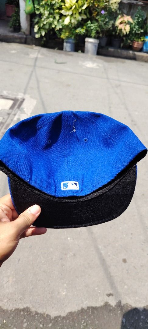 Authentic Onfield Toronto Blue Jays MLB Blue Cap Size 7 (Category: Caps & Hats) located in Paranaque City. Submitted by easymommygo (Listing ID 1466976814, Image 2). Description: - Bright blue Toronto Blue Jays baseball cap - Embroidered front team logo with red maple leaf - Classic fitted flat brim design - MLB batterman logo on the back - Vibrant color with clean stitching all around.