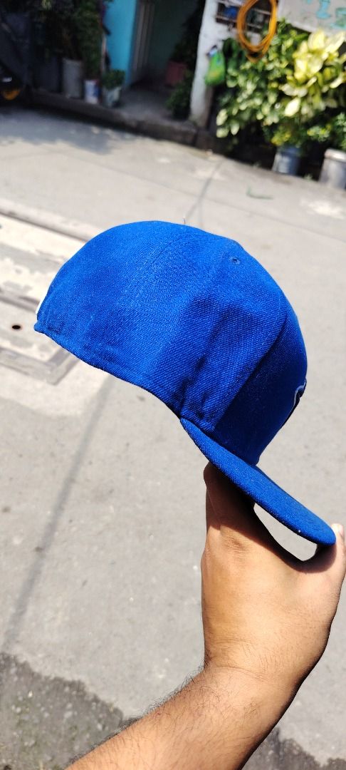 Authentic Onfield Toronto Blue Jays MLB Blue Cap Size 7 (Category: Caps & Hats) located in Paranaque City. Submitted by easymommygo (Listing ID 1466976814, Image 3). Description: - Bright blue Toronto Blue Jays baseball cap - Embroidered front team logo with red maple leaf - Classic fitted flat brim design - MLB batterman logo on the back - Vibrant color with clean stitching all around.