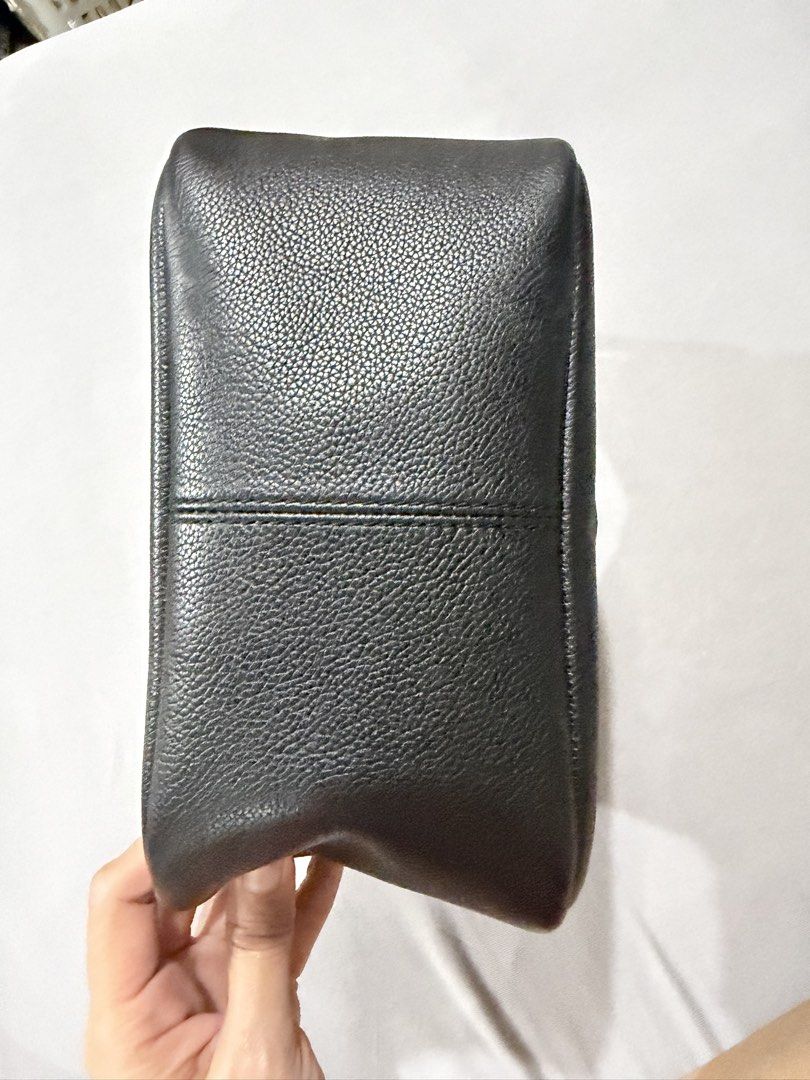 Authentic Tory Burch Black Leather Shoulder Bag (Category: Luxury Bags & Wallets) located in Quezon City. Submitted by rc1415 (Listing ID 1467049028, Image 2). Description: - Brand: Tory Burch - Material: Premium black pebbled leather - Hardware: Gold-tone with adjustable buckle strap - Design: Debossed double T logo on the front, structured base - Interior: Clean light-colored lining with an open slip pocket - Condition: Immaculate, clean exteri