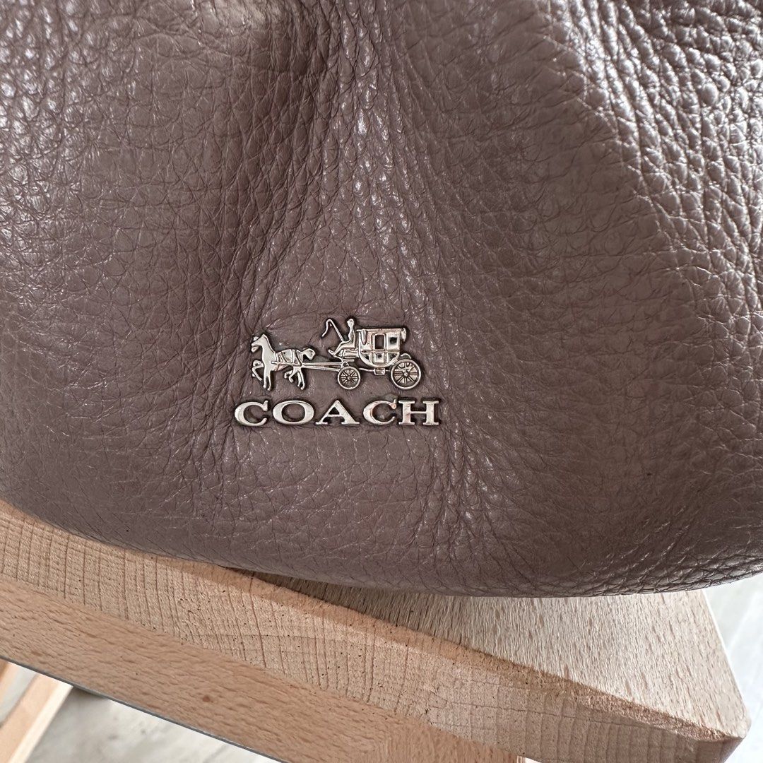 Authentic Vintage Coach Leather Hobo Bag (Category: Luxury Bags & Wallets) located in Paranaque City. Submitted by closetmalou (Listing ID 1467116257, Image 3). Description: Authentic Vintage Coach Leather Hobo Bag Beautiful Coach shoulder bag in a unique taupe-mauve shade, featuring soft pebbled leather, silver-tone hardware, a spacious interior, and a zippered front pocket. A timeless everyday bag with a relaxed, slouchy silhouette. Size: * Bot