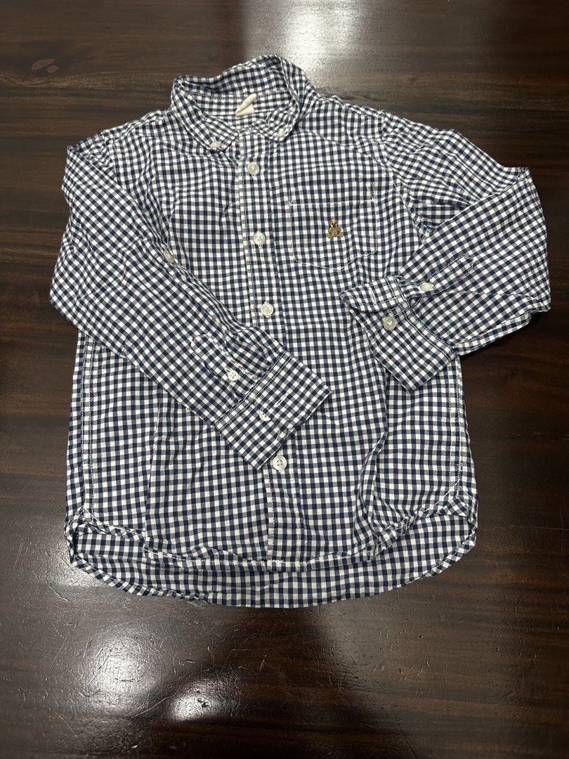 Baby Gap Navy Blue Gingham Button-Down Shirt Size 5 Years (Category: Babies & Kids Fashion) located in Caloocan City. Submitted by janine2006 (Listing ID 1467035513, Image 2). Description: Baby Gap navy blue and white check button-down shirt. Size 5 years or 110 cm. 100% cotton fabric. Classic collar, long sleeves, and single chest pocket with a small gold bear logo embroidered on it. Front button closure. Fit up to 6 year old .