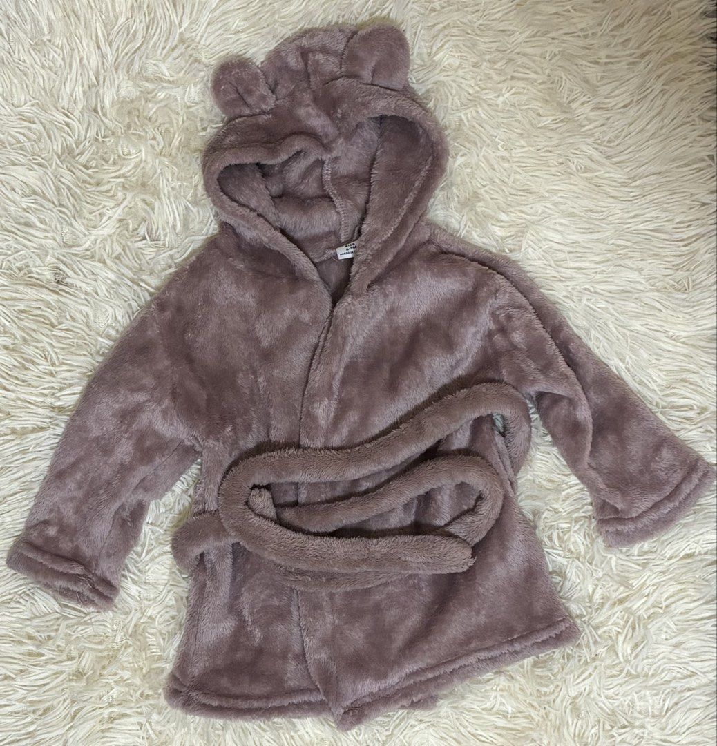 Baby plush hooded bathrobe with bear ears (Category: Babies & Kids Fashion) located in Santa Cruz. Submitted by zellethrifts (Listing ID 1467151490, Image 1). Description: • Used once baby mile stone • Fits 0-12 months • In excellent condition 🚚 Shipping via J&T only 📦 Shipping fee to be shouldered by buyer 💳 Mode of payment: GCash 📍 Santa Cruz, Laguna.