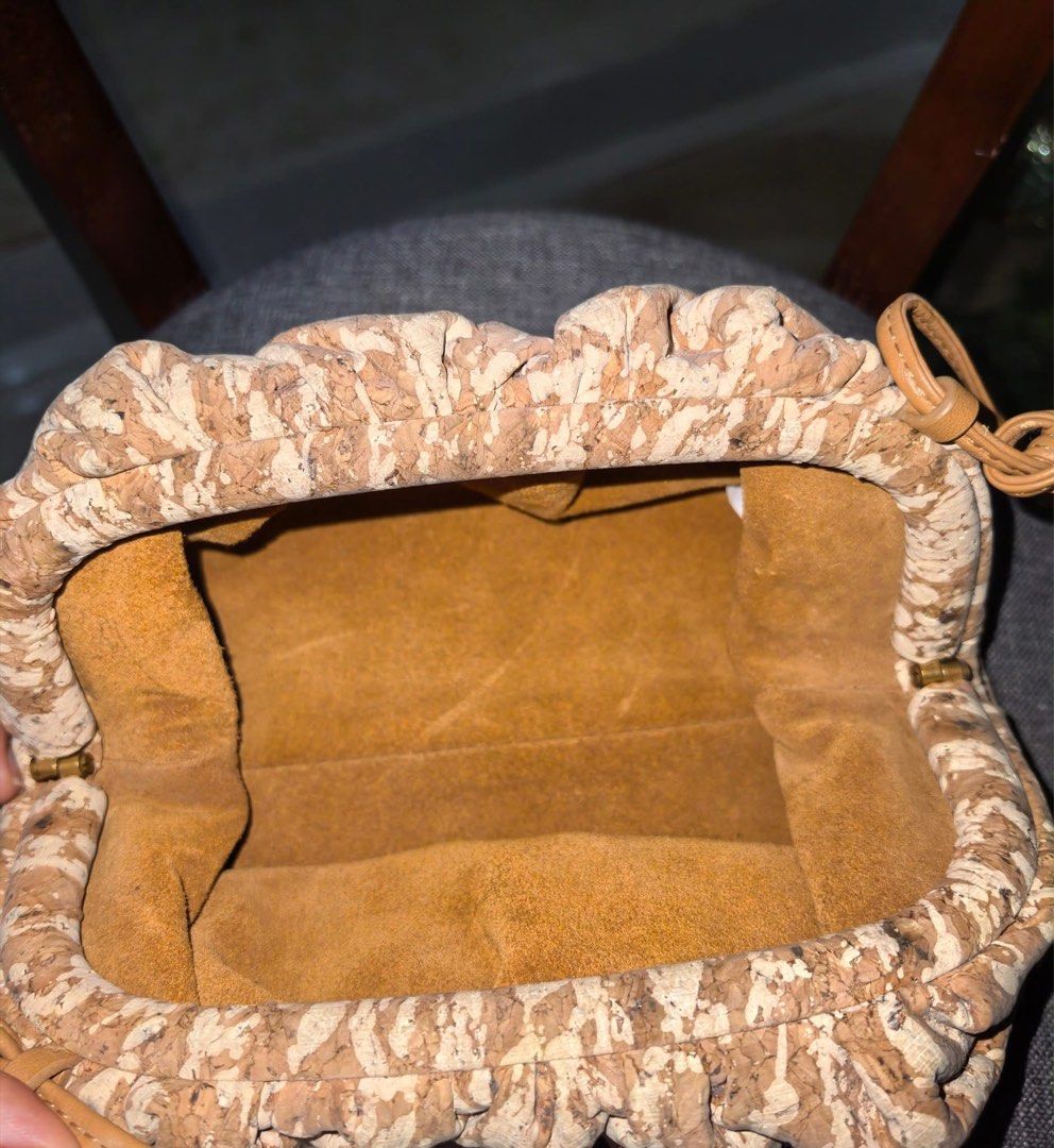 Bag (Category: Clutches) located in Sariaya. Submitted by hand2you14 (Listing ID 1466985390, Image 3). Description: The mini pouch bag Bottega veneta In cork style Guaranteed authentic .