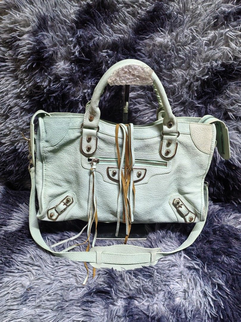 Balenciaga (Category: Luxury Apparel) located in Iloilo. Submitted by luxury.ilo1984 (Listing ID 1467037035, Image 3). Description: Thrifted Ukay Source Very Good to Excellent Condition Rank A Silver hardware Coded & lampo zep Dimes 9.5inch by 14.5 inch Bag only no inclussion.