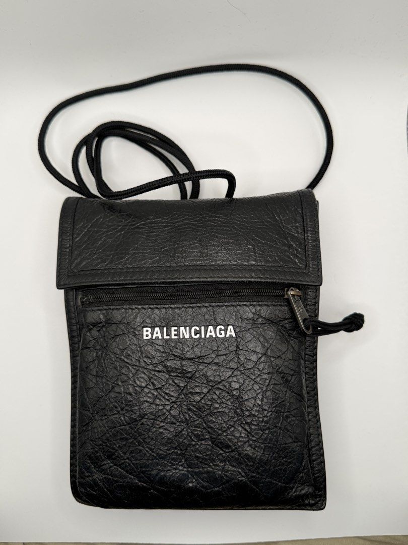 Balenciaga Explorer Pouch with Crossbody Strap (Category: Cross-body Bags) located in Quezon City. Submitted by crsq_shop (Listing ID 1467015809, Image 1). Description: ✨ PRELOVED BALENCIAGA EXPLORER POUCH WITH STRAP – SMALL ✨ A sleek and modern designer essential, perfect for everyday use. 🖤 • Balenciaga Explorer Pouch with Strap • Size: Small • Preloved 💰 ₱16,999 📩 DM for inquiries. Disclaimer: CRSQ_Shop is not associated nor affiliated with