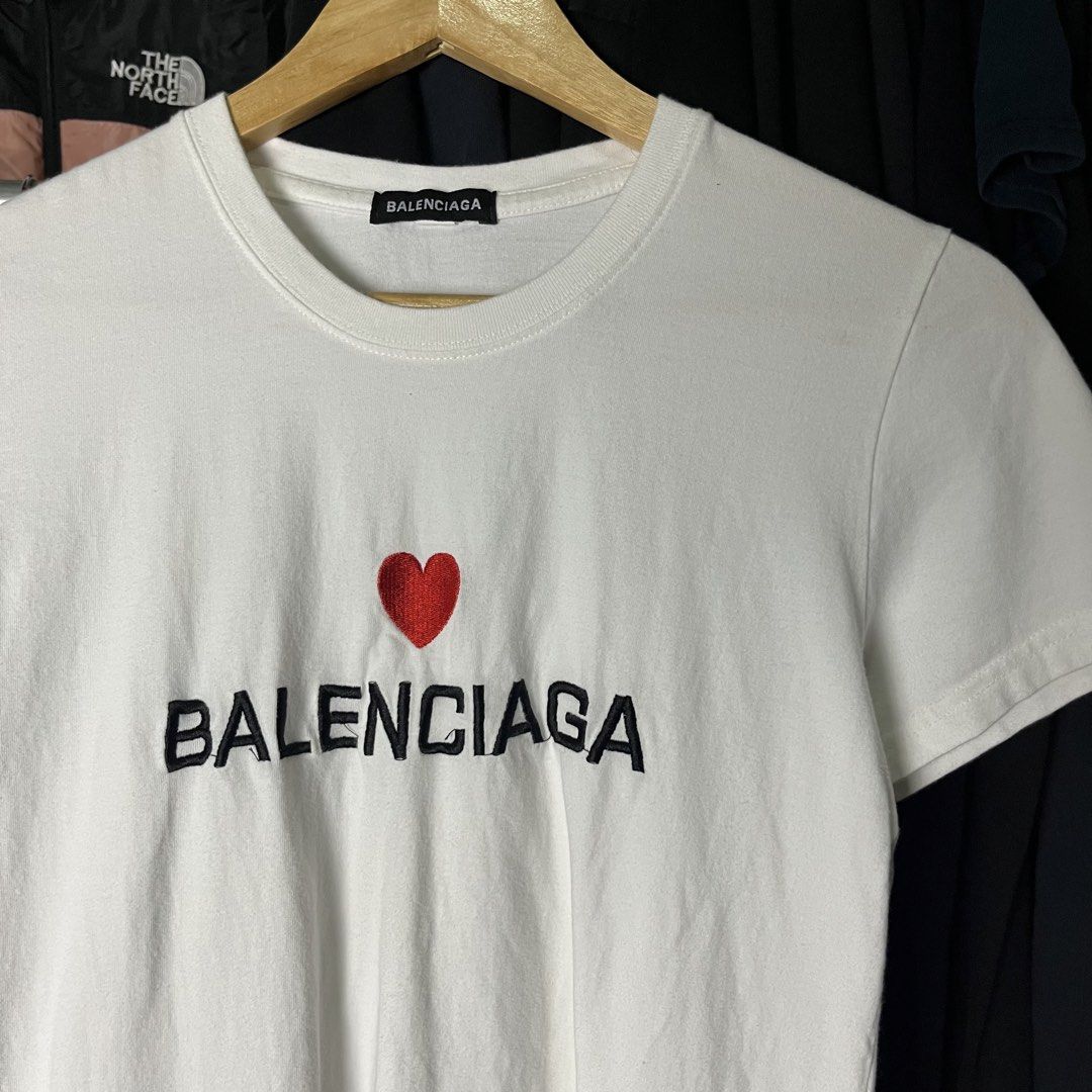 BALENCIAGA HEART LOGO DESIGN (Category: Luxury Apparel) located in Daet. Submitted by wearthriftingcloth. (Listing ID 1467143931, Image 2). Description: 👕BALENCIAGA Size:S Measurement: W17xL23 Issue(s): NONE Condition: 9.5/10 Color rate: 9.5/10 ➡️Swipe- to see more detail pic 📌No Deleting/Cancelation‼️ 📌Color may Vary Due to Lighting‼️ 📌Please be responsible buyer Bogus/Flaker will be posted‼️ 📌All ltems Need Wash‼️.